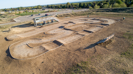 A dirt track with a white line down the middle