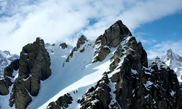 Elbrus in snow Europe's highest peak Elbrus symbol of untouched mountain beauty. Elbrus majestic giant in realm of high mountains Crowned with snow it whispers tales of time and nature's might.