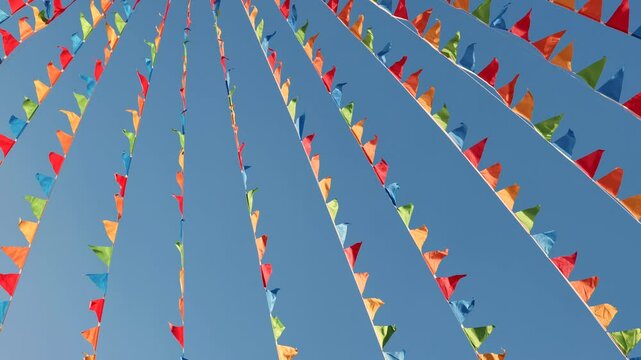 Colorful triangular flags waving in the wind in Moscow