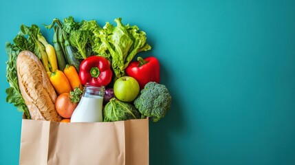 Fresh produce and groceries in a brown paper bag against a bright solid background showcasing healthy eating and local shopping