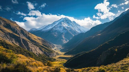 Fototapeta premium A serene landscape featuring a valley with a majestic mountain in the background, ideal for use in travel, adventure, or environmental-related projects