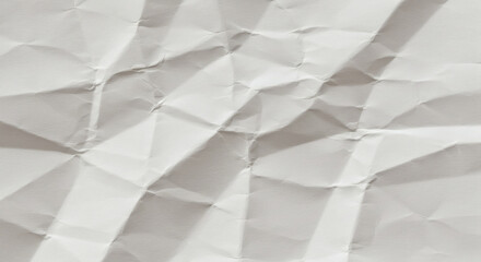Fototapeta premium The crumpled texture of white paper creates an interesting background, perfect for various creative and professional purposes.