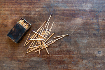 A matchbox with several matches.Vintage still life top view.