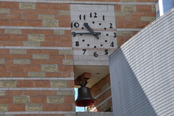 Clock tower with bell at University of Arizona in Tucson