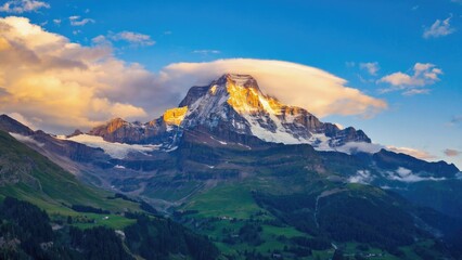 A mountain covered in snow and clouds, great for winter or nature scenes
