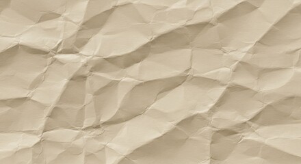 Obraz premium Close up of a beige crumpled paper texture with visible folds and shadows creating an abstract pattern