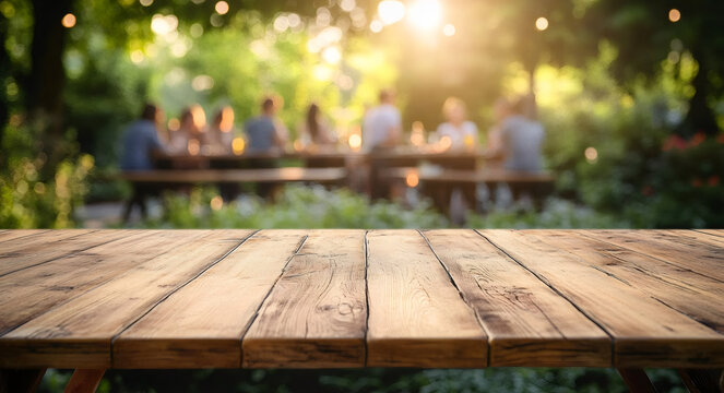 Empty wooden table and blurred view of a group of people having BBQ barbecue outdoors. Wallpaper, Wood desk in front of a natural garden background. Summer lifestyle Concept, Background,outdoors, bar-