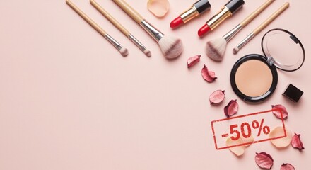 Makeup brushes and cosmetics with discount on pink background