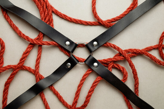 Entwined jute rope creates complex designs, showcasing the artistry of shibari