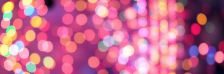 Colorful bokeh lights create a festive atmosphere during a nighttime celebration in the city center