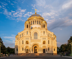 Fototapeta premium Kronstadt, Russia - 07.27.24. Majestic Naval Cathedral Exterior in Evening Sunlight