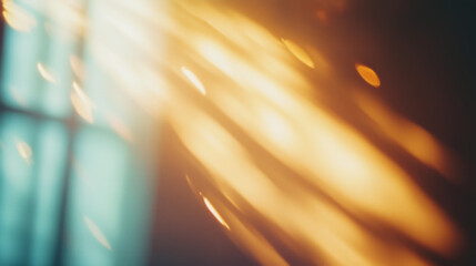 Cozy golden sunlight streaks creating a dreamy effect through a window, abstract background