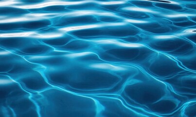 Fototapeta premium An abstract view of crystal clear ocean water displaying beautiful light patterns and vibrant blue color.