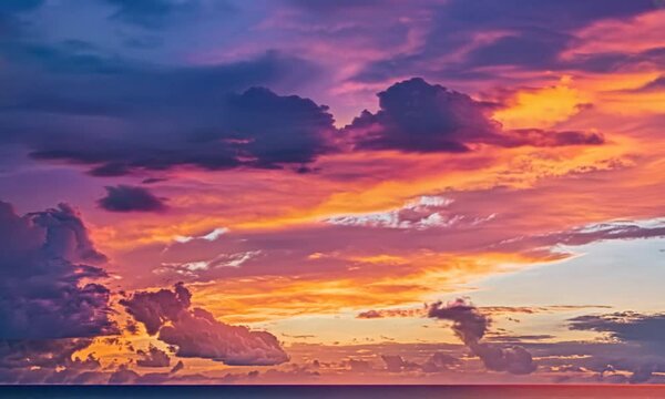 Timelapse fluffy Cumulus clouds moving in bright sunset sky. Abstract aerial nature summer ocean sunset, sea and sky view. Vacation, travel, holiday concept. Weather and Climate Change. Vertical video
