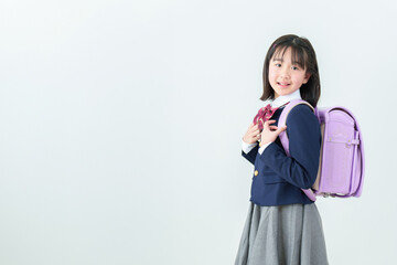 Naklejka premium ランドセルを背負った小学生の女の子