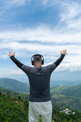 A Mature Latino Man, with Gray Hair, Taking in the Breathtaking Scenery of the Colombian Mountains