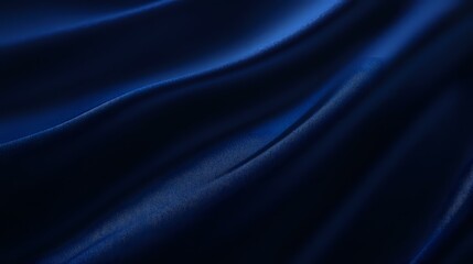 Luxurious dark blue silk fabric with elegant waves and folds creating dramatic light effects and shadows against deep navy background, suitable for luxury design projects.