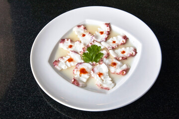 Octopus carpaccio, raw octopus tiradito with red or spicy sauce, seafood