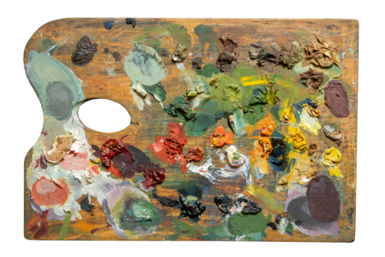 Old wooden artist palette with dried colorful oil paints isolated on white background cut out top view of traditional painting tool, textured pigment color mixes, creative art tools concept, nobody