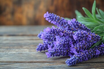 Fototapeta premium Lavender sprigs rest beautifully on a weathered wooden surface, creating a calming atmosphere full of natural warmth and rustic beauty Generative AI