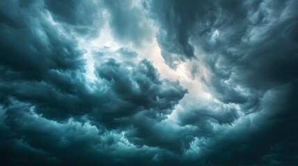 Obraz premium Dramatic Low Angle View of Storm Clouds in the Sky for Atmospheric and Nature Concepts