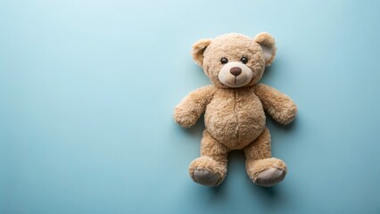 Obraz premium Clean Overhead Teddy Bear Photography on Solid Color Background for Product Display and Creative Design Space