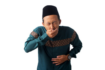 Asian Muslim man feeling queasy with his hand covering his mouth, possibly due to food poisoning...