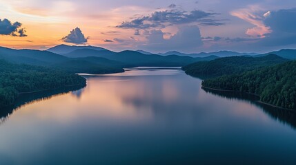 Serene Sunset Over Tranquil Lake Surrounded by Lush Mountains