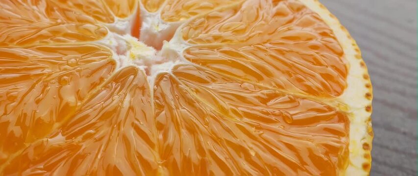 Anamorphic video of Orange Close Up, Macro Shot Juicy Orange