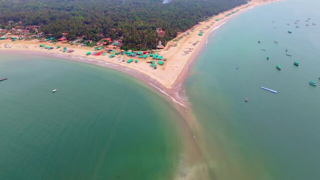 Aerial View Tropical Beach with Green Roofed Canopy