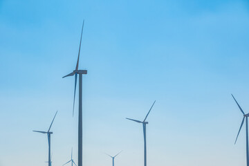 Wind farm on the mountain on blue sky day wind energy concept alternative energy Renewable energy