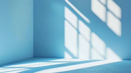 Obraz premium Light blue minimalistic background for product presentation with beautiful light and shadow on the wall and floor.