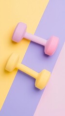 Pastel dumbbells on colorful background; fitness, health, workout