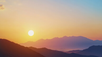 breathtaking sunset over mountain landscape, showcasing vibrant colors and serene beauty