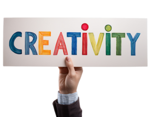 Hand holding a sign with Creativity in colorful letters