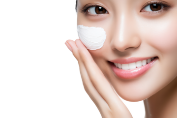 portrait of young asian beautiful smiling female touching cheeks with fingers as if applying skincare cream