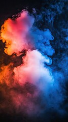 Obraz premium Colorful smoke swirls against dark background