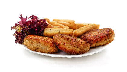 A plate of fried cutlets and lettuce.