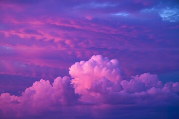 A photo of a sky during dawn or dusk with hues of purple, pink, and blue
