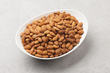 Almond is a deciduous tree in the rose family. It grows to about 6 meters in height and has lanceolate leaves with serrations.
