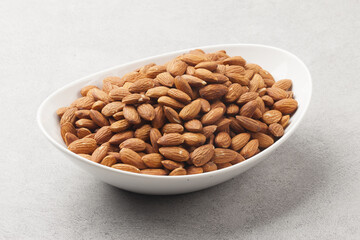 Almond is a deciduous tree in the rose family. It grows to about 6 meters in height and has lanceolate leaves with serrations.
