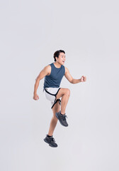 Portrait of healthy Asian man exercising on white background