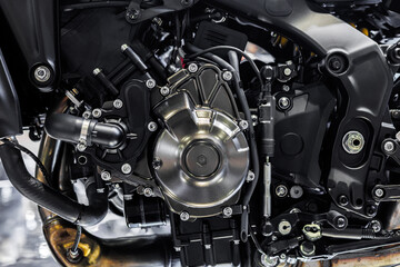 Closeup modern high Performance racing motorcycle engine metal part