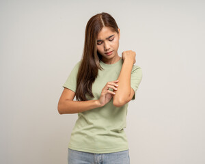 Asian women have skin problems She felt irritation on her skin. Skin infection itching red rash scratching with hands. Unwell unhealthy female standing on isolated background