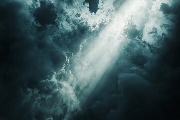 Dramatic sky, light breaking through dark clouds