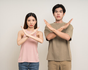 Bad relationship unhappy asian couple quarreling in various action gesture standing on isolated white background. Shouting angry man and woman stressed has problem in Married life