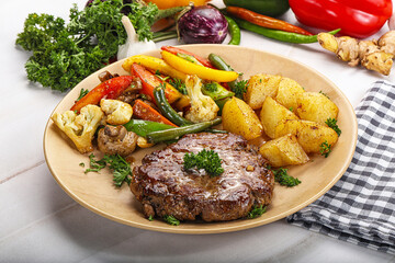Roasted beef steak with potato