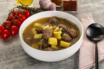 Soup with meatball and potato
