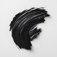 Black paint stroke on white backdrop