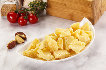 Crushed parmesan cheese in the bowl